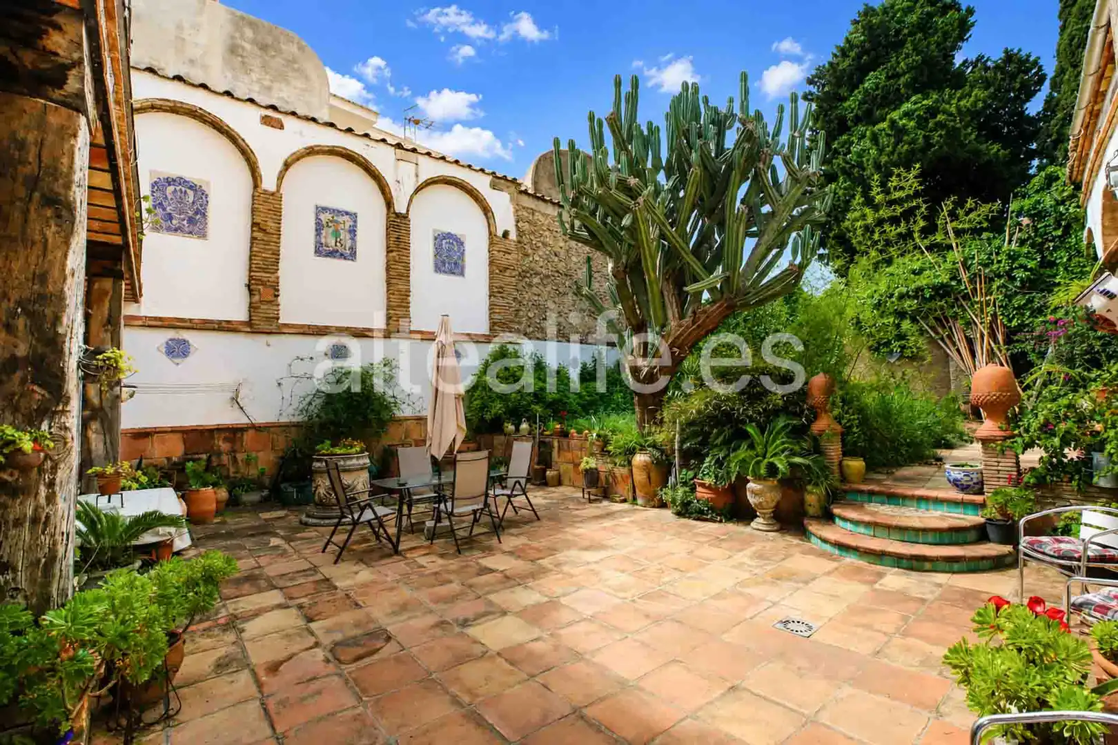 Garten von Einfamilien-Reihenhaus zum Verkauf in Gandia mit Privatgarten, Terrasse und Abstellraum