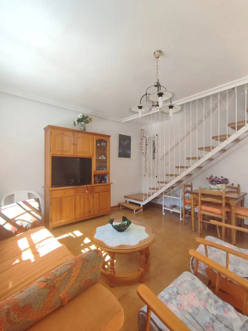 Sala de estar de Casa adosada en venta en San Pedro del Pinatar con Aire acondicionado, Calefacción y Jardín privado