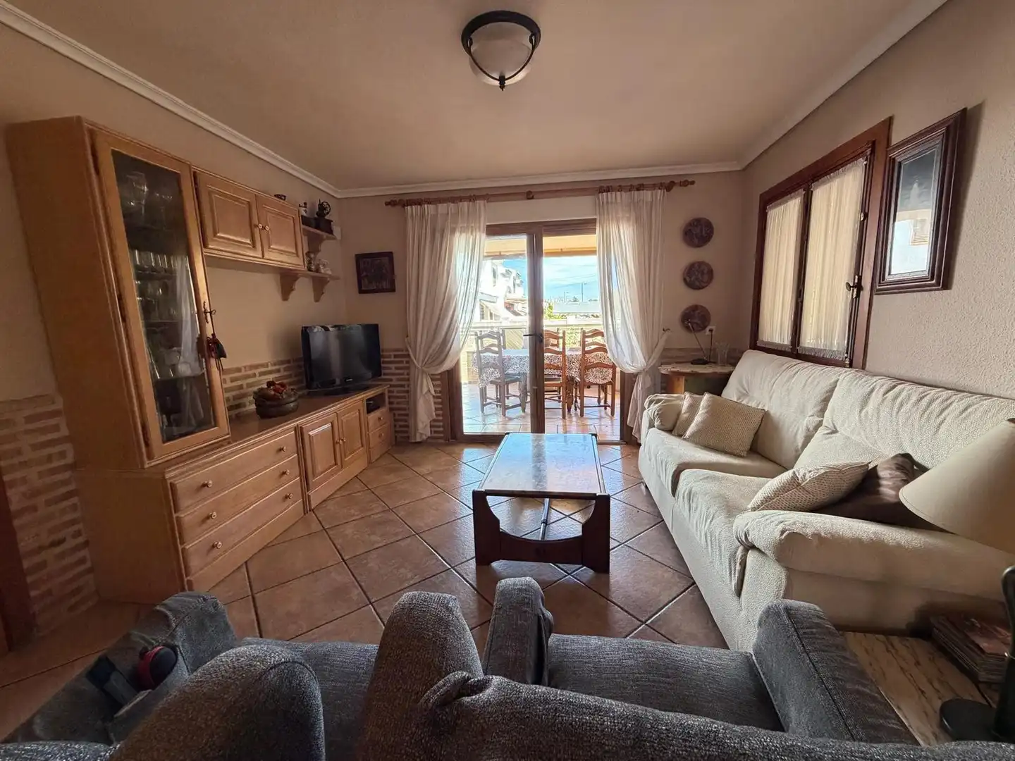 Sala d'estar de Casa o xalet de lloguer en Sagunto / Sagunt amb Aire condicionat, Jardí privat i Terrassa