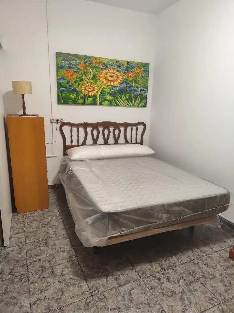 Dormitori de Casa adosada de lloguer en Almería amb Aire condicionat, Rentadora i Microones