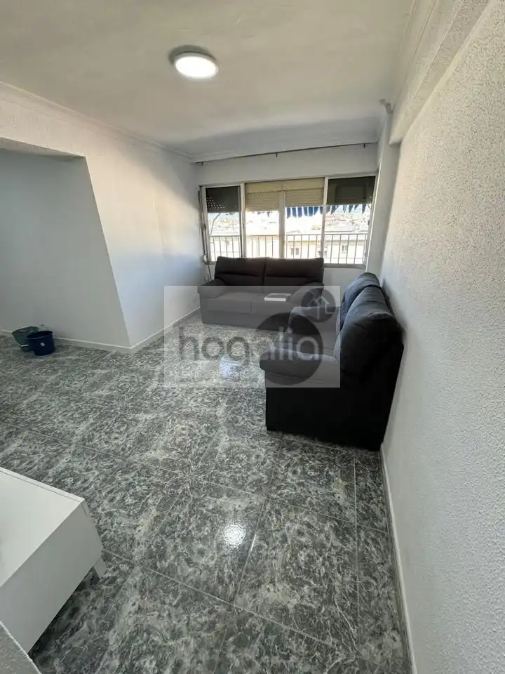 Sala d'estar de Pis de lloguer en Sevilla amb Aire condicionat i Moblat