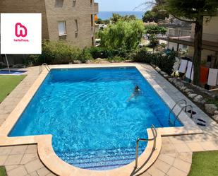Swimming pool of Planta baja for sale in Salou  with Air Conditioner, Heating and Private garden