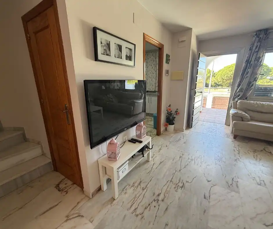 Sala de estar de Casa o chalet de alquiler en El Portil con Aire acondicionado, Terraza y Amueblado