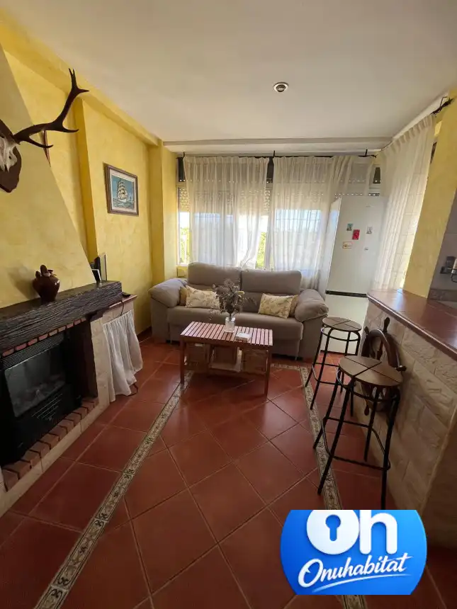 Sala de estar de Piso en venta en El Rompido con Jardín privado, Piscina y Amueblado