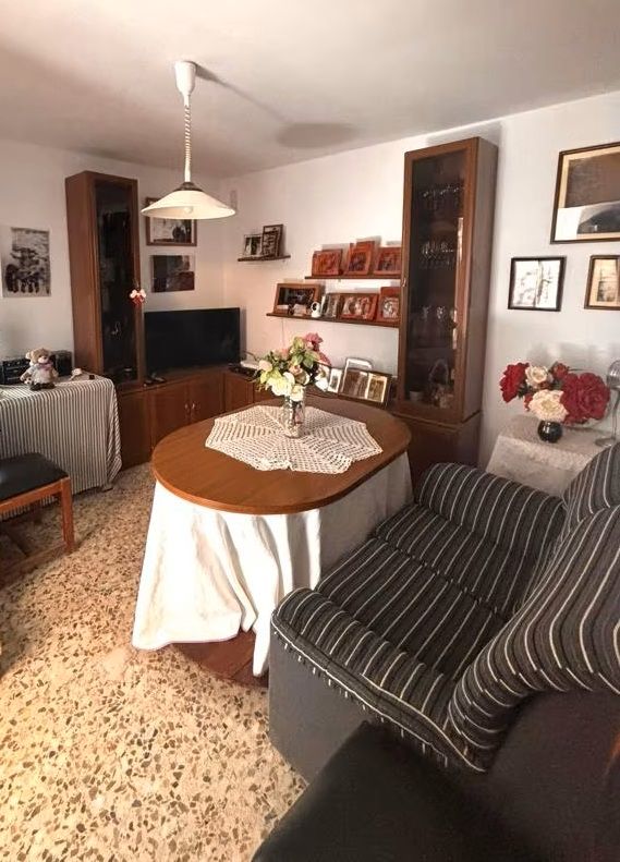 Sala d'estar de Casa adosada en venda en Málaga Capital