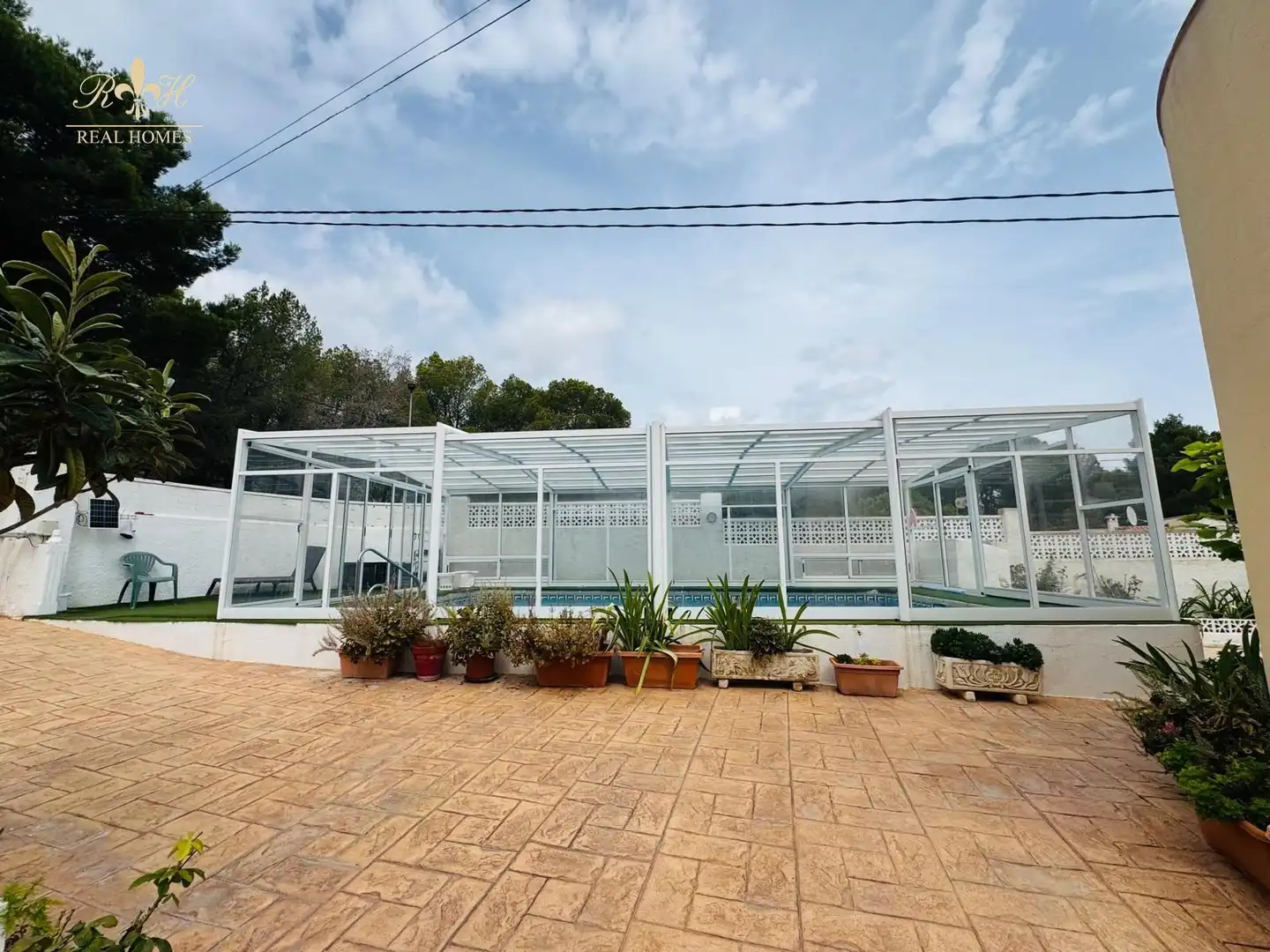 Schwimmbecken von Einfamilien-Reihenhaus zum Verkauf in L'Alfàs del Pi mit Klimaanlage, Terrasse und Schwimmbad