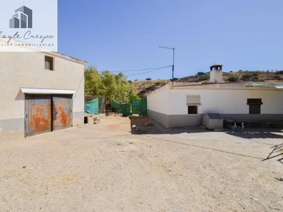 Vista exterior de Finca rústica en venda en Cacín amb Piscina