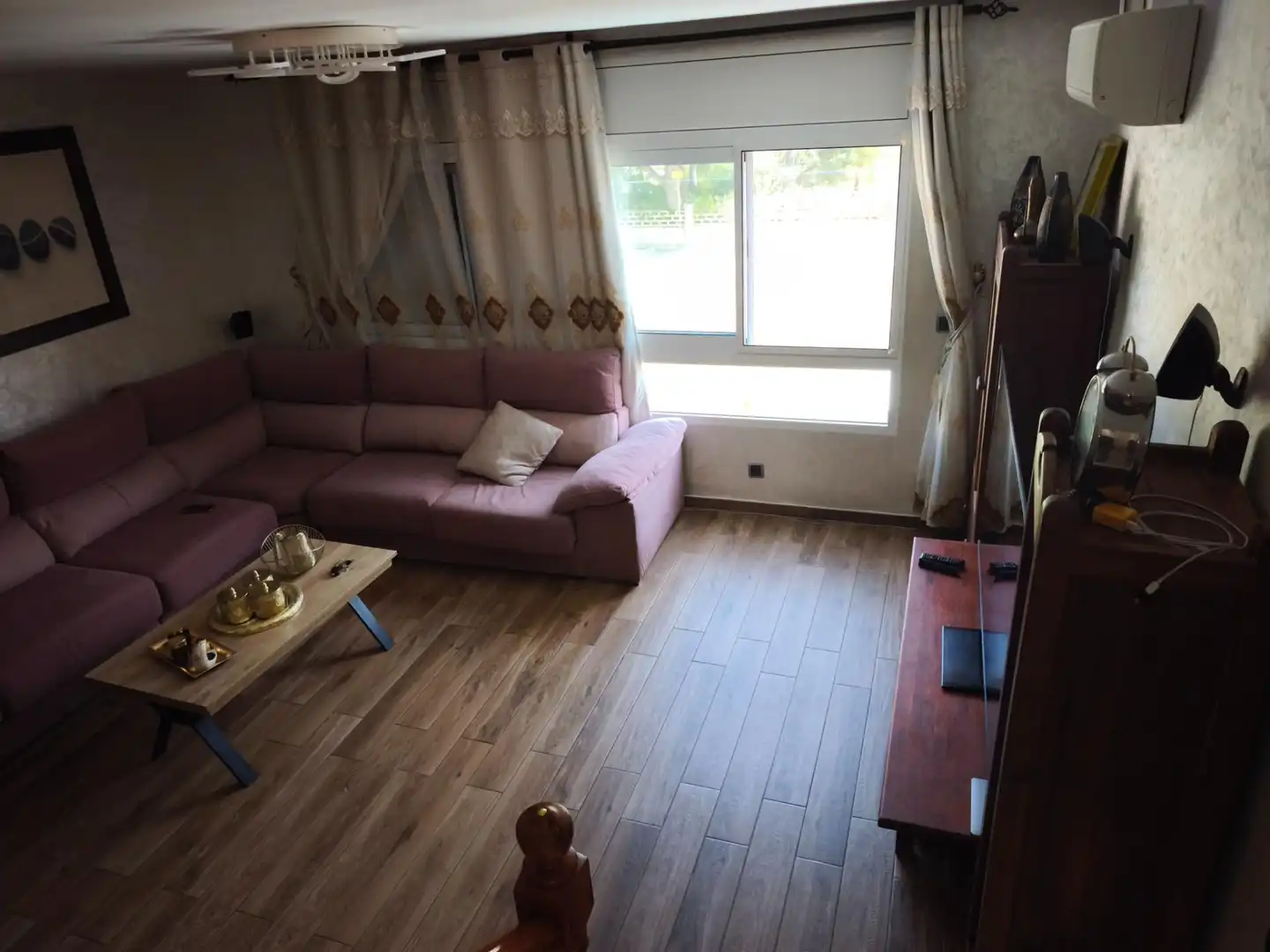 Sala d'estar de Casa adosada en venda en La Ràpita amb Jardí privat, Terrassa i Traster