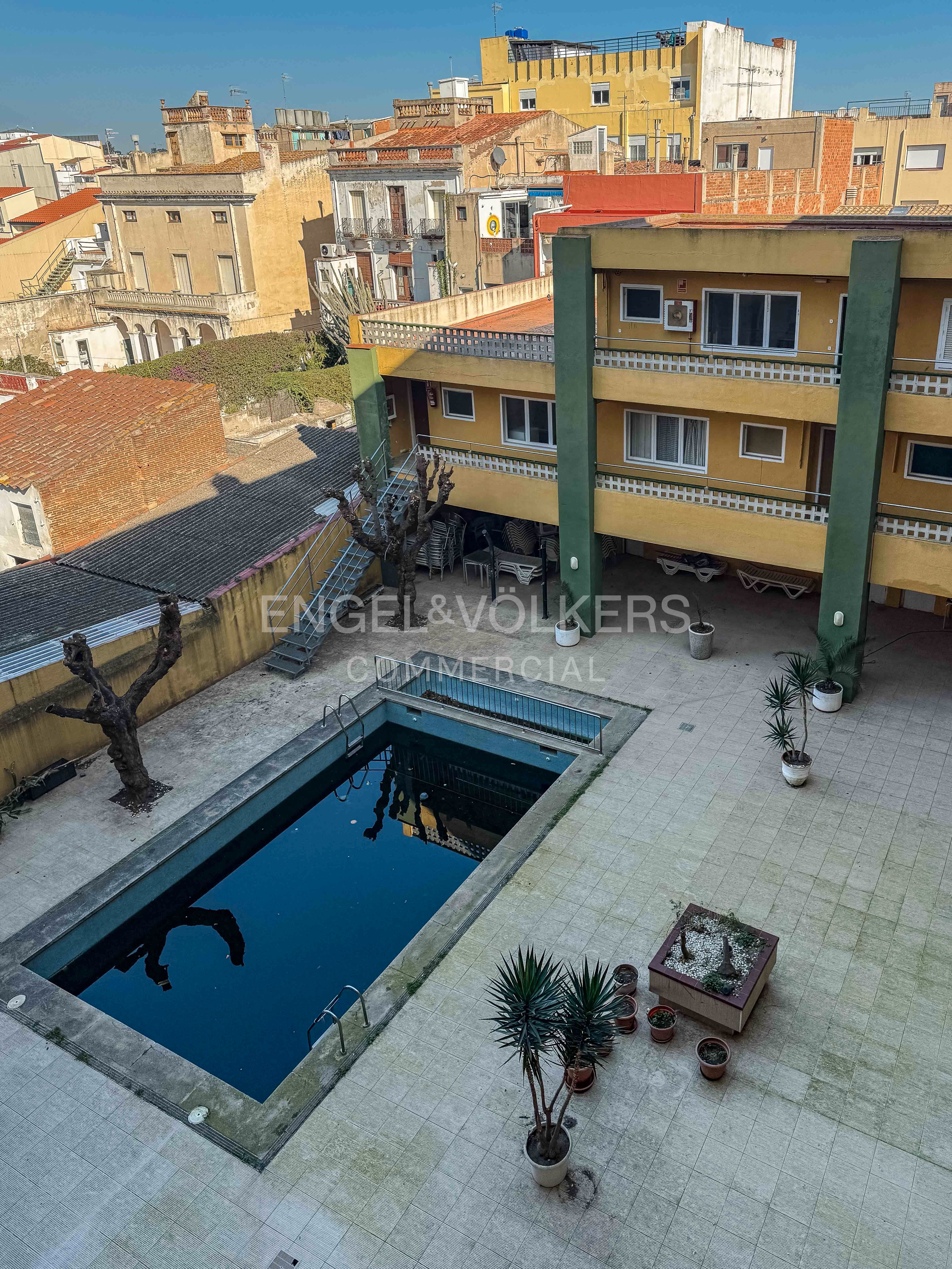 Swimming pool of Building for sale in Malgrat de Mar