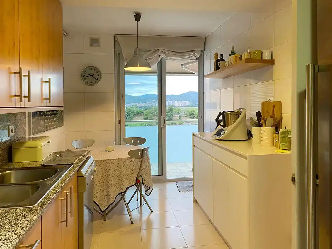 Kitchen of Attic for sale in Sant Joan Despí  with Air Conditioner, Swimming Pool and Balcony