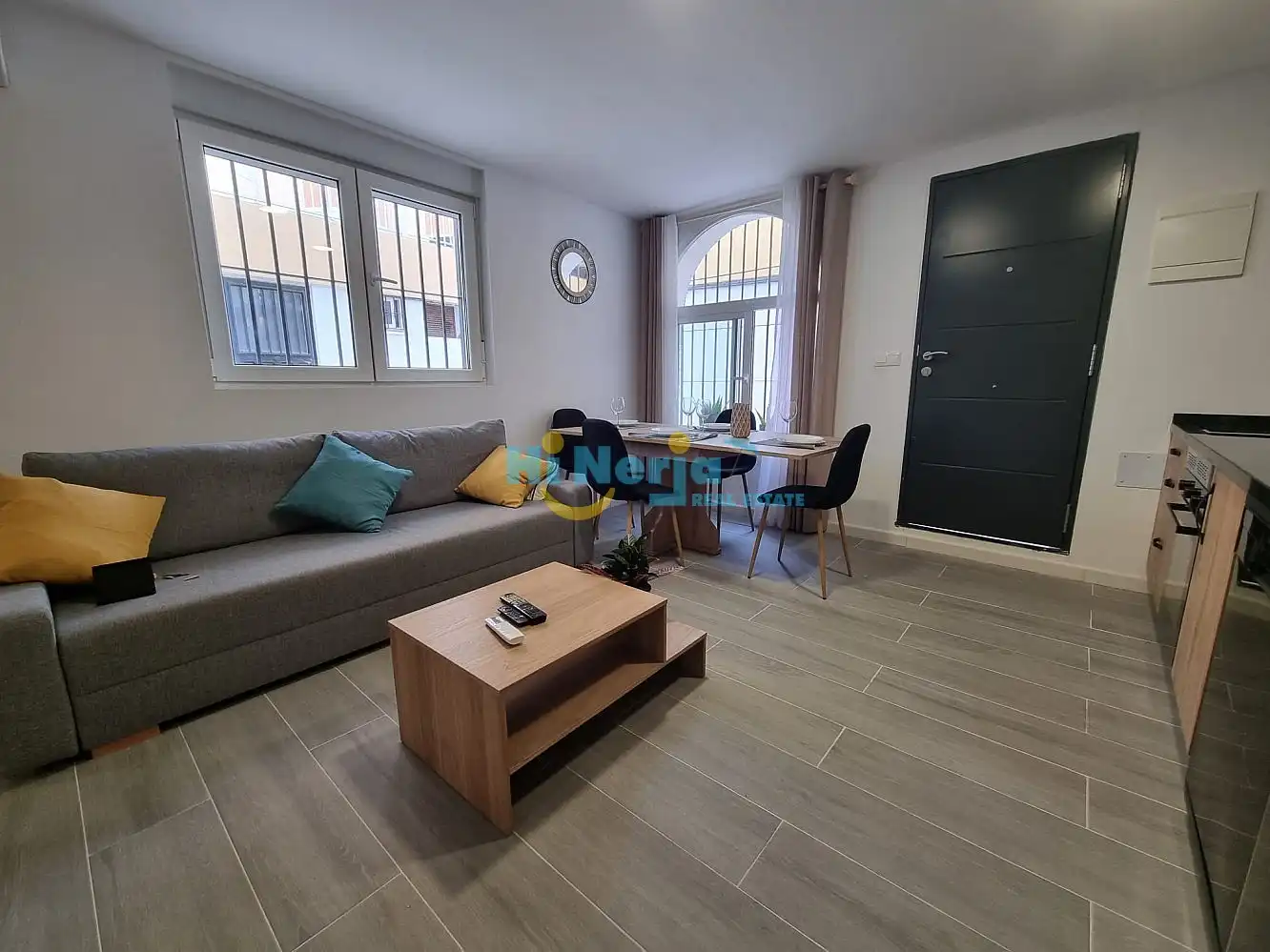 Sala d'estar de Apartament en venda en Torrox amb Aire condicionat, Calefacció i Jardí privat