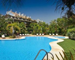 Swimming pool of Planta baja for sale in Marbella  with Air Conditioner, Heating and Terrace