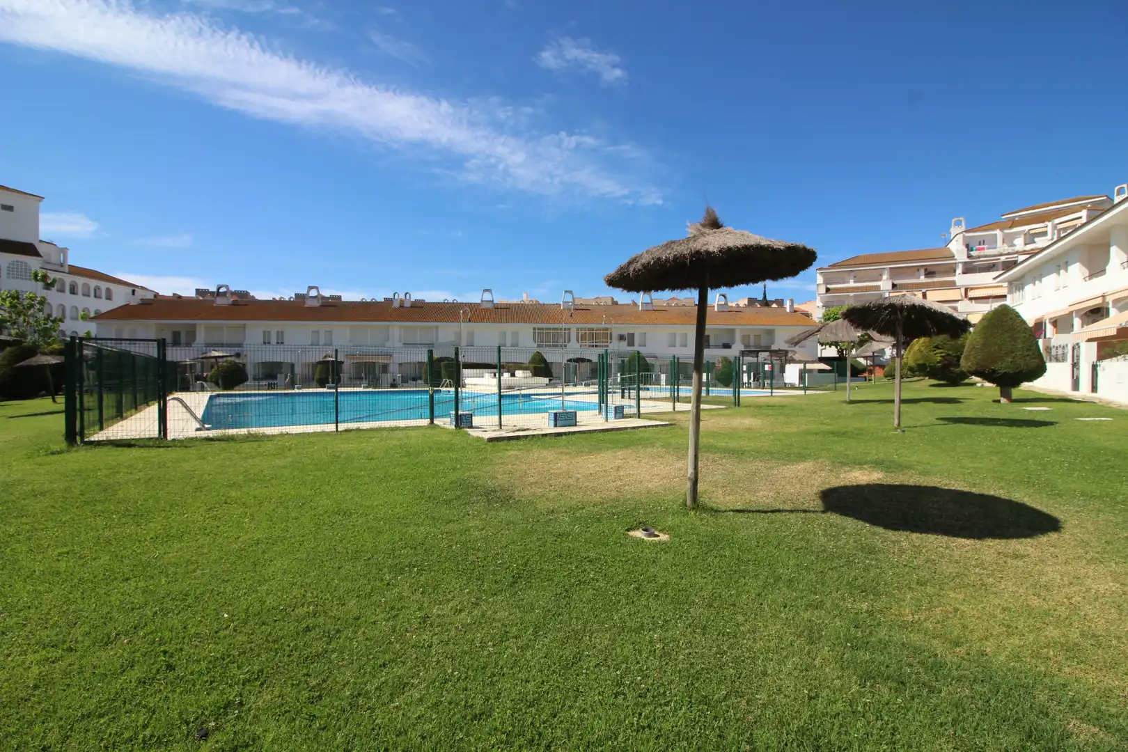 Swimming pool of Detached homes for sale in El Portil  with Terrace, Storage room and Community pool
