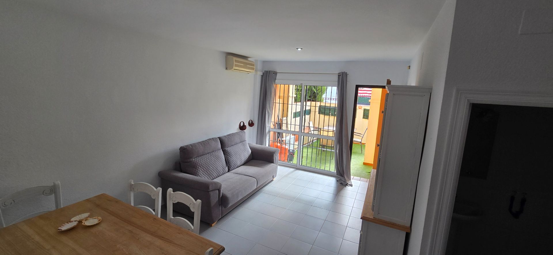 Living room of Single-family semi-detached for sale in El Portil  with Air Conditioner, Terrace and Furnished