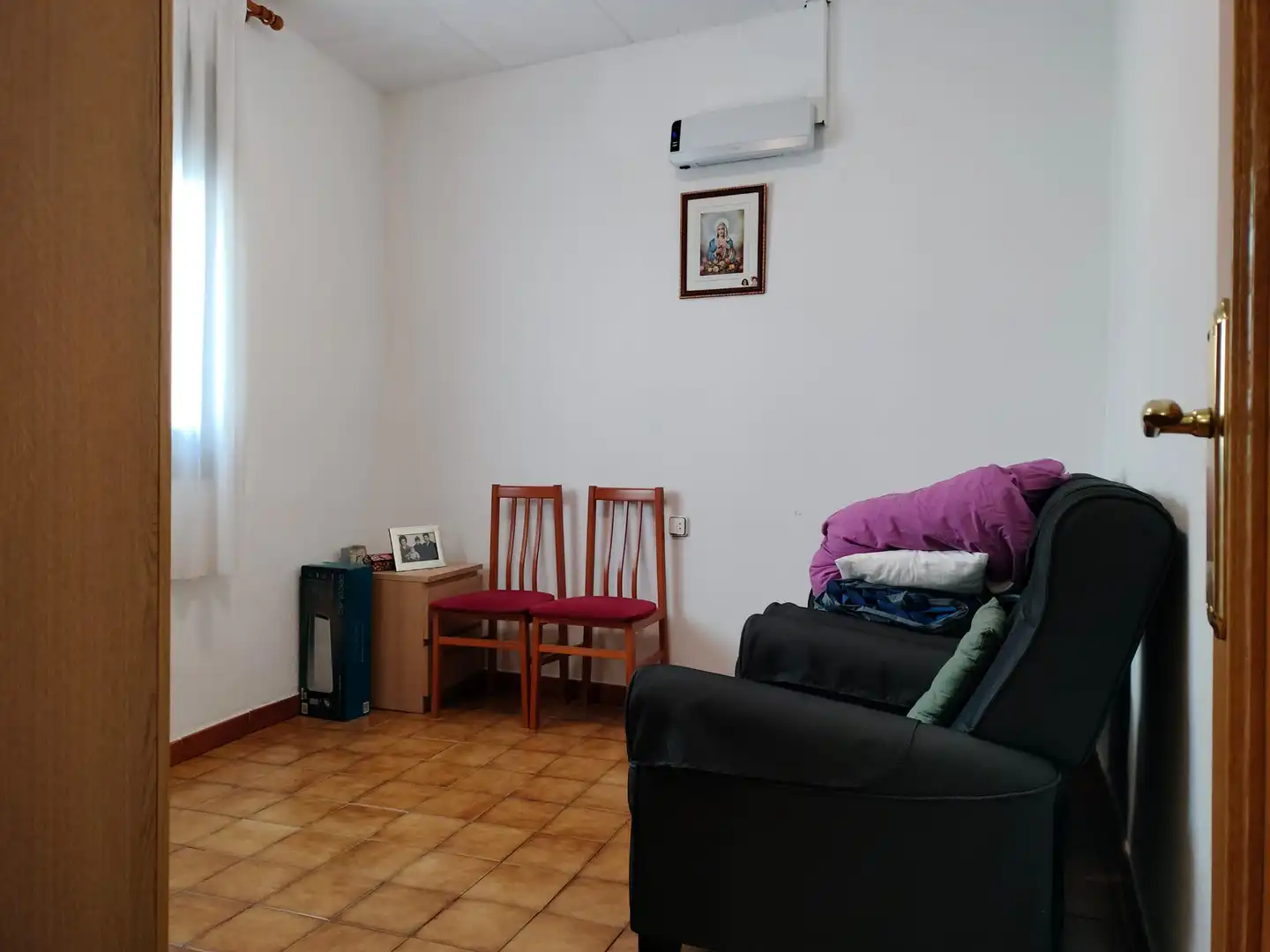 Sala d'estar de Casa adosada en venda en Sabadell amb Terrassa