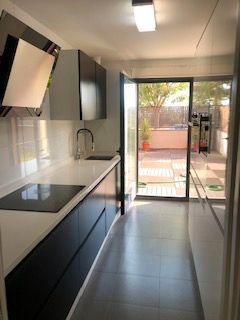 Kitchen of Flat to rent in Mairena del Aljarafe  with Air Conditioner, Private garden and Oven