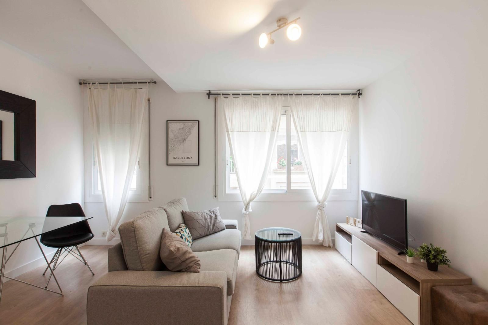 Sala de estar de Piso de alquiler en  Barcelona Capital con Aire acondicionado, Parquet y Amueblado