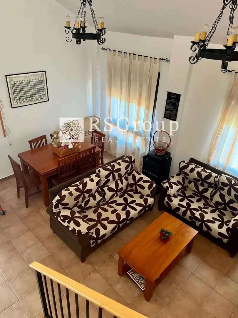 Sala d'estar de Casa o xalet en venda en El Real de la Jara amb Aire condicionat, Jardí privat i Terrassa