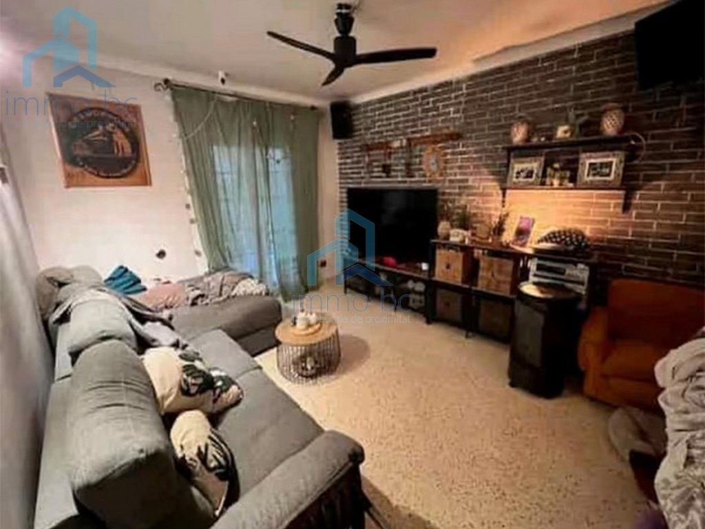 Sala d'estar de Casa adosada en venda en Reus