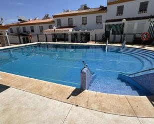 Swimming pool of Single-family semi-detached for sale in Punta Umbría  with Terrace and Balcony