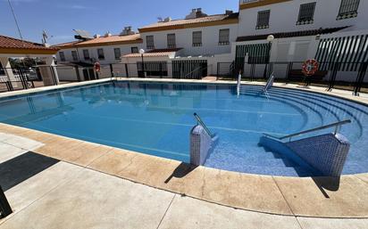 Swimming pool of Single-family semi-detached for sale in Punta Umbría  with Terrace and Balcony