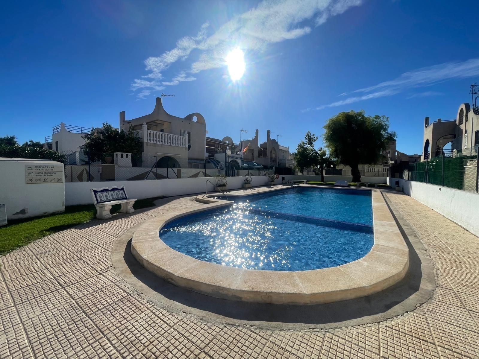 Swimming pool of Single-family semi-detached for sale in Torrevieja  with Air Conditioner, Heating and Terrace