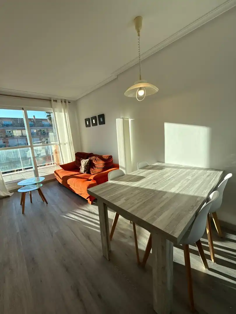 Sala d'estar de Apartament en venda en Dénia amb Aire condicionat, Jardí privat i Terrassa
