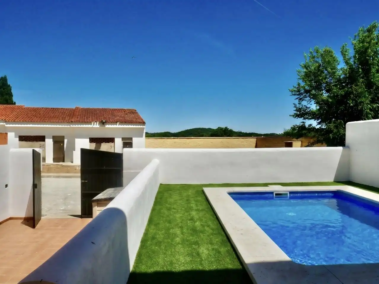 Piscina de Casa adosada en venta en El Ronquillo con Jardín privado, Terraza y Piscina