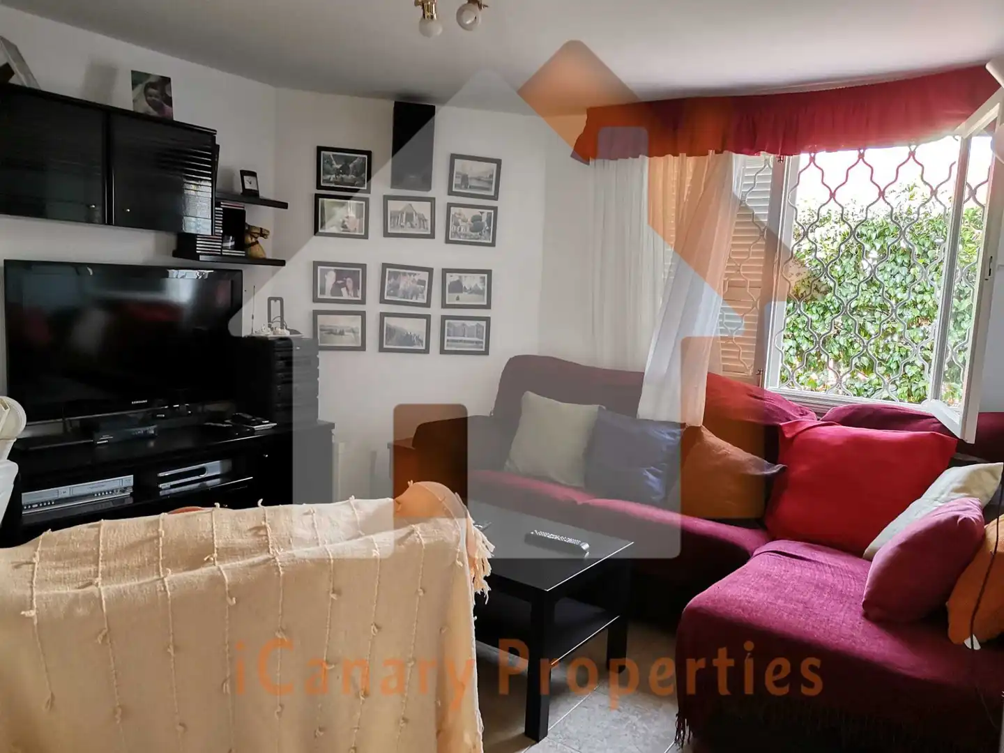 Sala de estar de Casa adosada de alquiler en San Bartolomé de Tirajana con Aire acondicionado, Jardín privado y Terraza