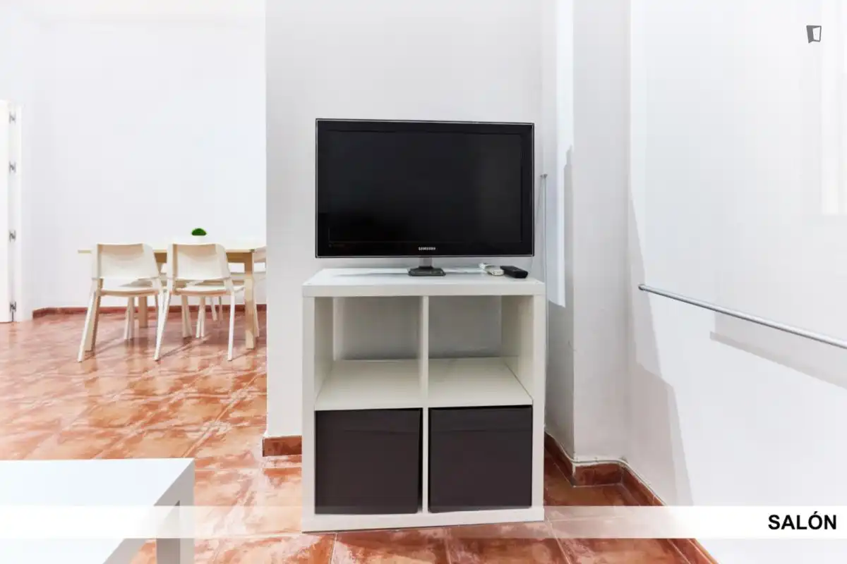 Sala d'estar de Apartament per a compartir en Alcalá de Guadaira amb Aire condicionat, Calefacció i Moblat