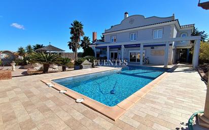 Vista exterior de Casa o xalet en venda en Guardamar del Segura amb Aire condicionat, Jardí privat i Terrassa