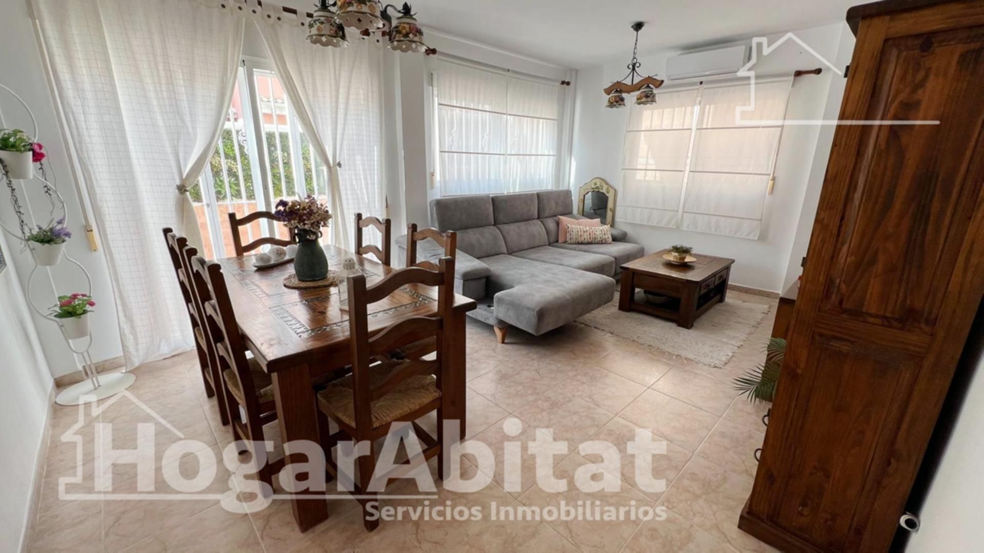 Sala de estar de Casa adosada en venta en Cullera con Terraza, Balcón y Piscina comunitaria