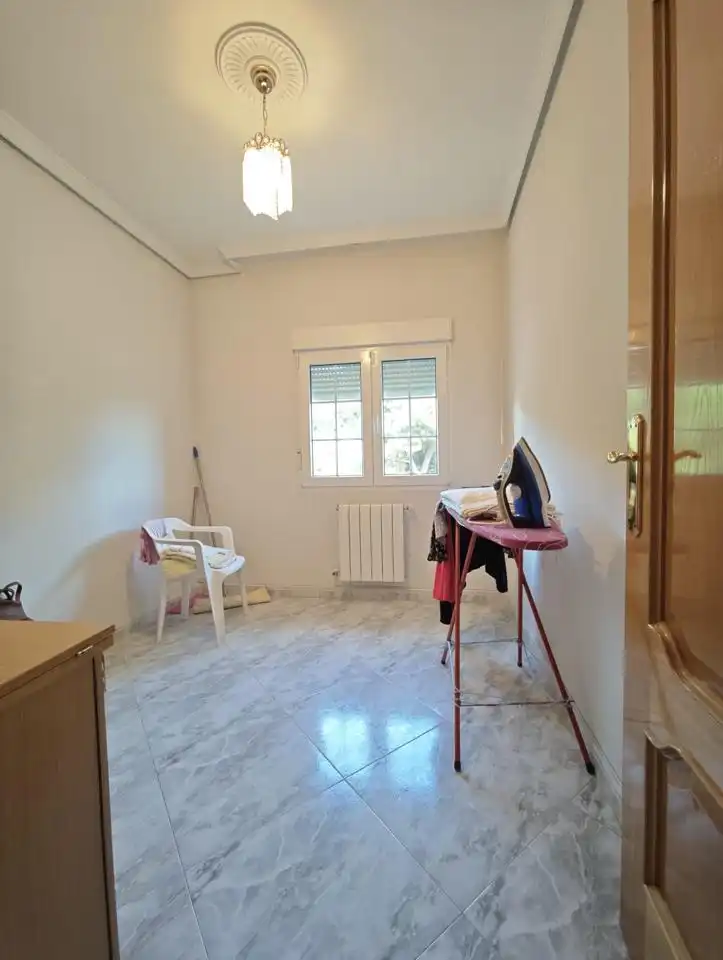 Habitación de Casa adosada en venta en El Álamo con Aire acondicionado, Calefacción y Jardín privado