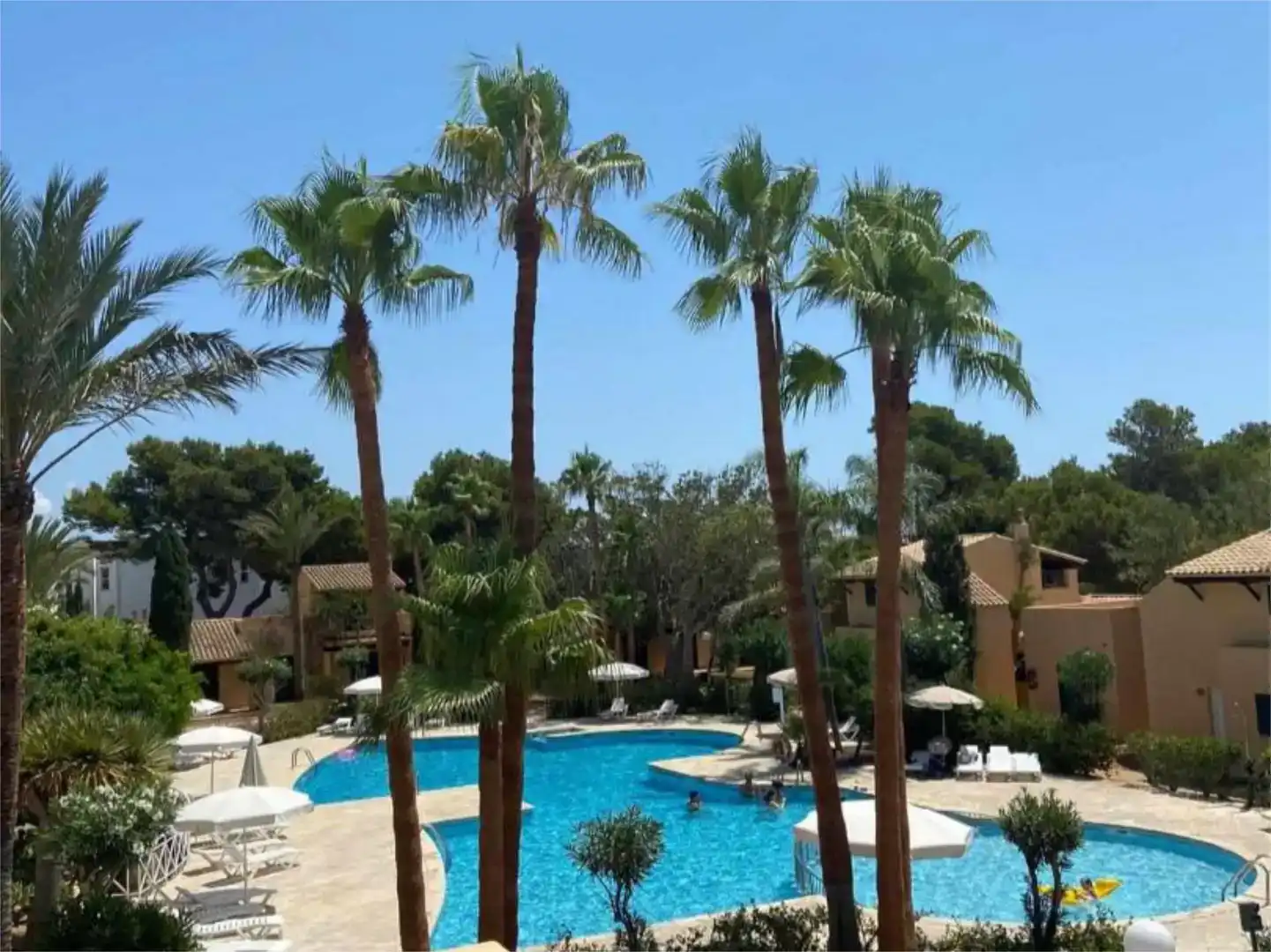 Piscina de Casa adosada de lloguer en Ciutadella de Menorca amb Aire condicionat, Jardí privat i Piscina
