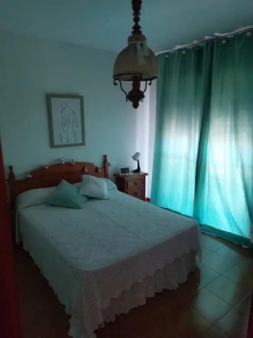 Dormitori de Casa adosada de lloguer en Conil de la Frontera amb Balcó