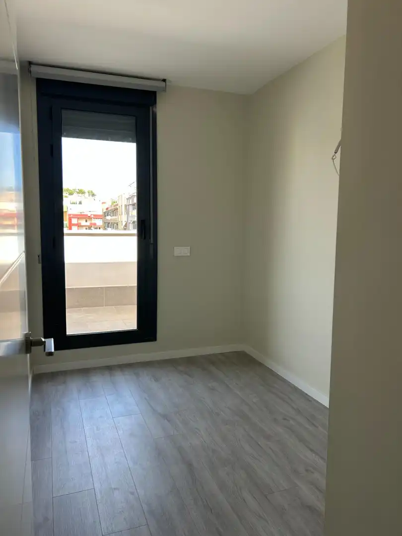 Habitación de Apartamento de alquiler en Dénia con Aire acondicionado, Jardín privado y Terraza