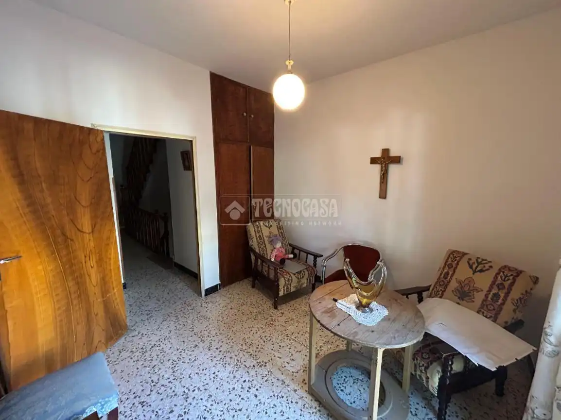 Sala d'estar de Casa adosada en venda en Baeza amb Aire condicionat i Balcó