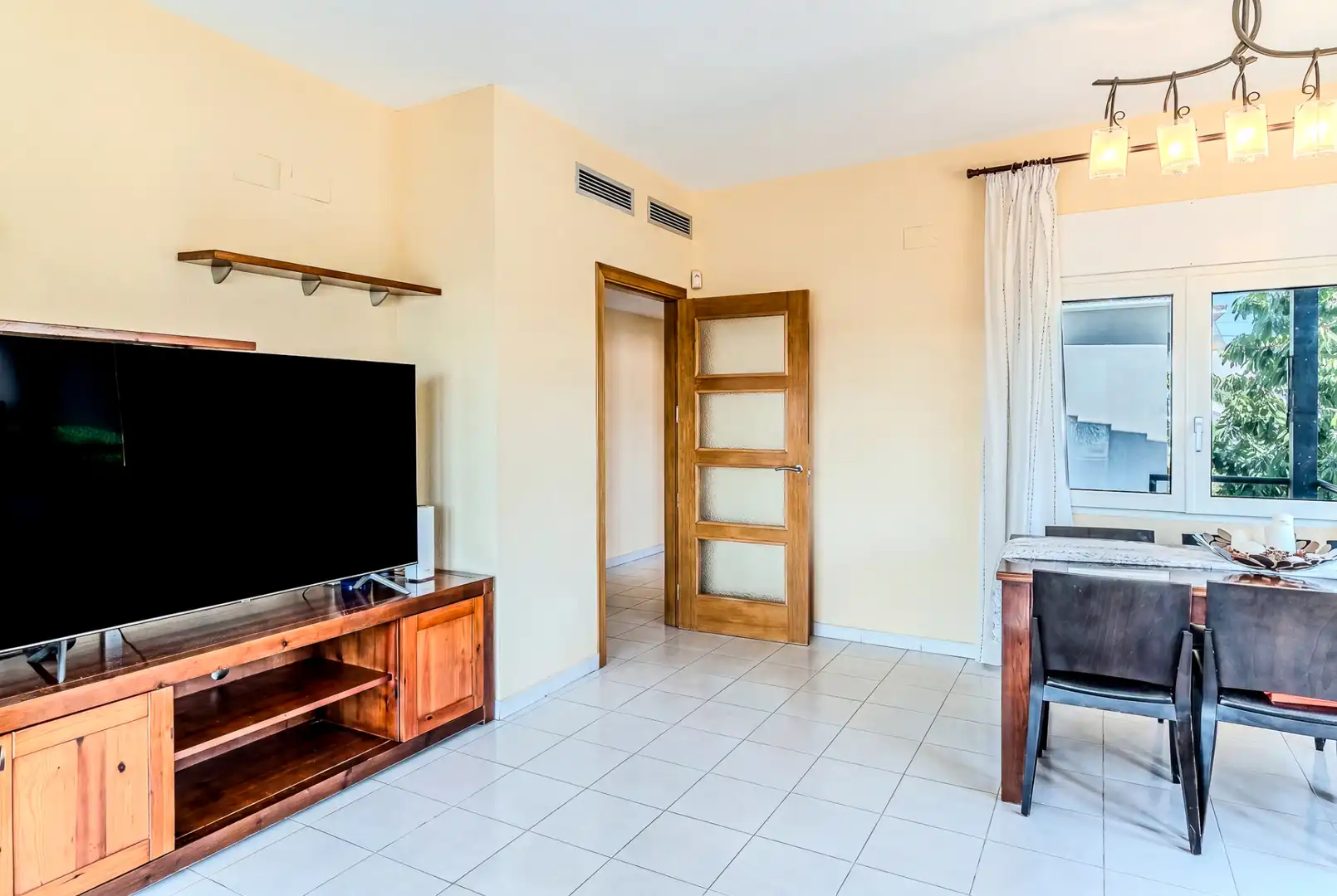 Sala d'estar de Casa o xalet en venda en L'Ampolla amb Aire condicionat, Calefacció i Jardí privat