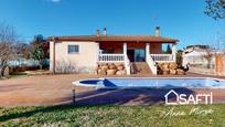 Vista exterior de Casa o xalet en venda en Caldes de Malavella amb Calefacció, Terrassa i Piscina