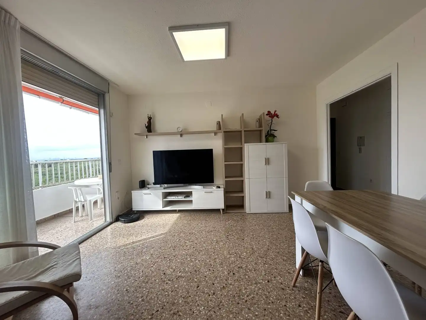 Sala d'estar de Apartament de lloguer en La Pobla de Farnals amb Moblat i Piscina comunitària