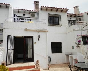 Exterior view of Single-family semi-detached for sale in L'Alfàs del Pi  with Air Conditioner and Swimming Pool