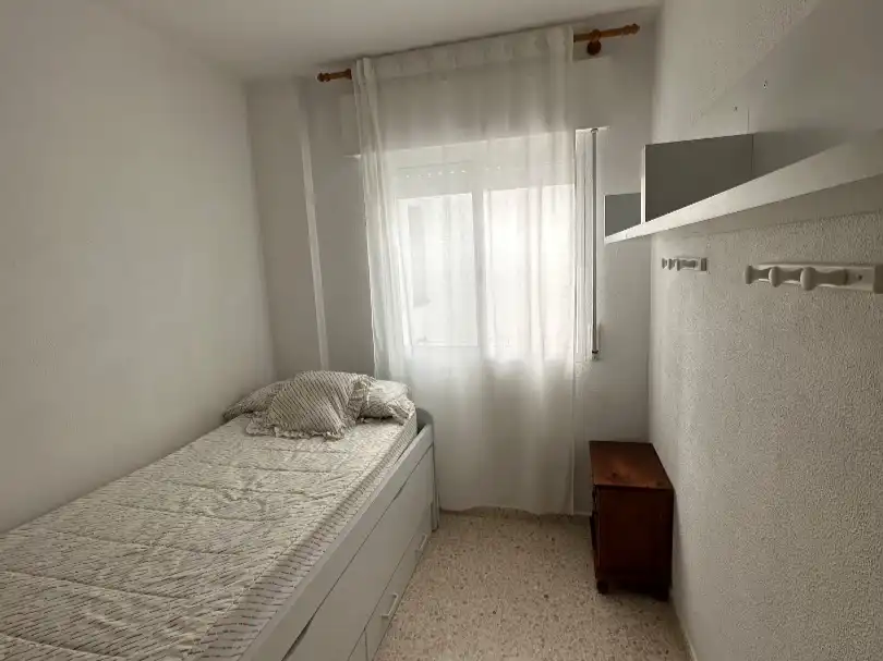 Habitación de Apartamento de alquiler en El Portil con Jardín privado, Terraza y Piscina