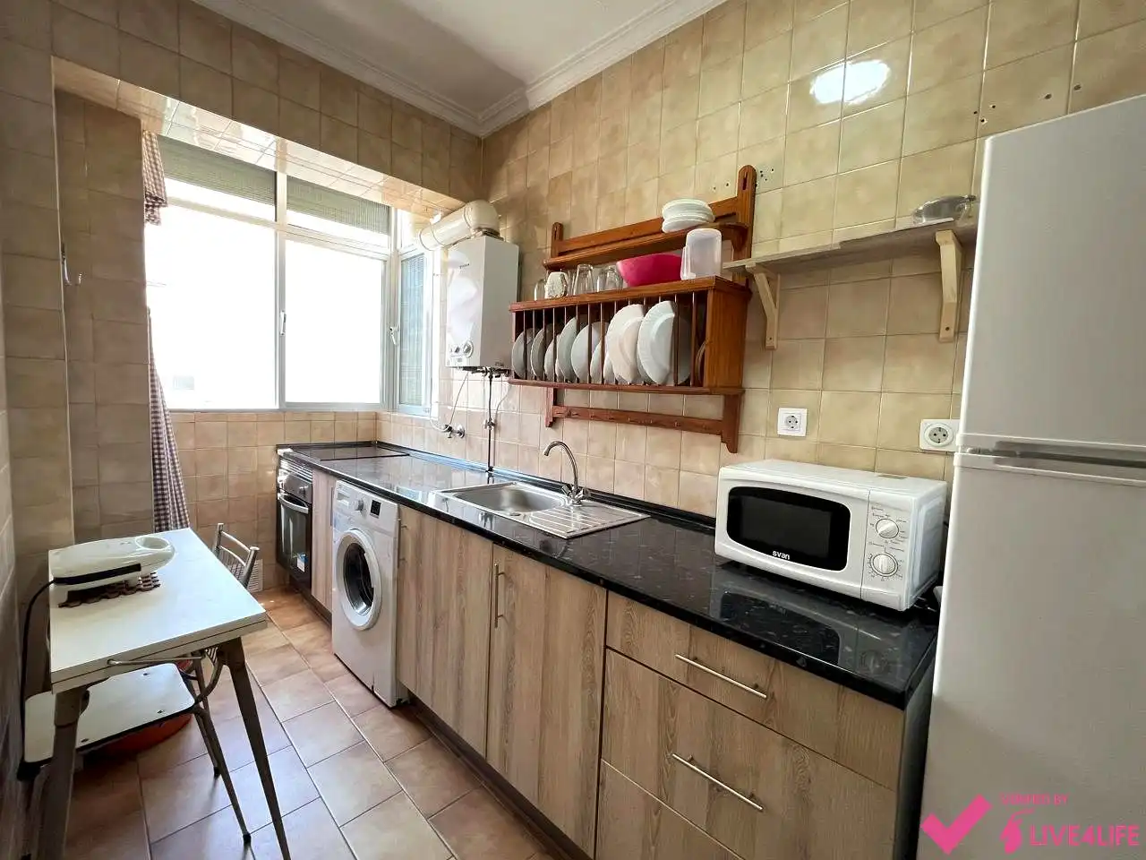 Kitchen of Flat for share in Sevilla  with Air Conditioner, Heating and Furnished