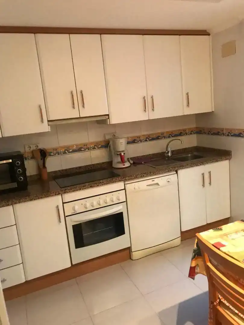 Cuina de Dúplex en venda en El Campello amb Aire condicionat, Parquet i Moblat