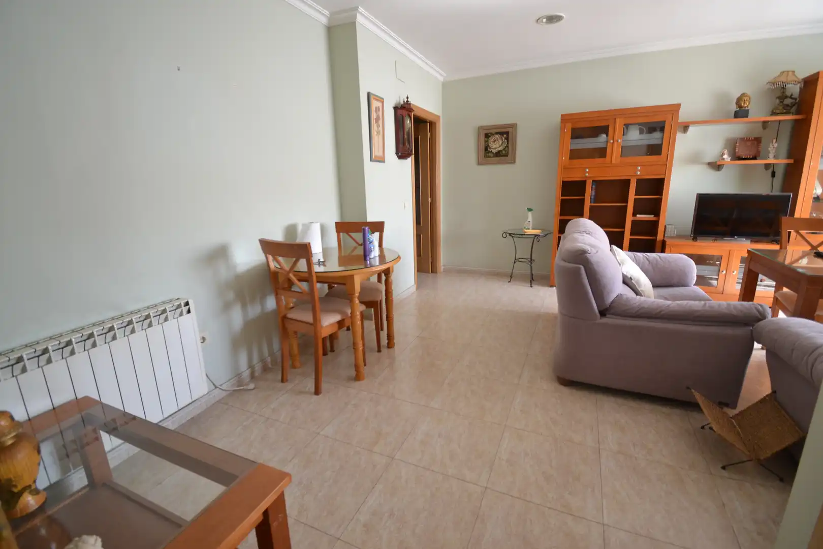Sala de estar de Casa adosada en venta en Malpartida de Plasencia con Calefacción, Terraza y Amueblado