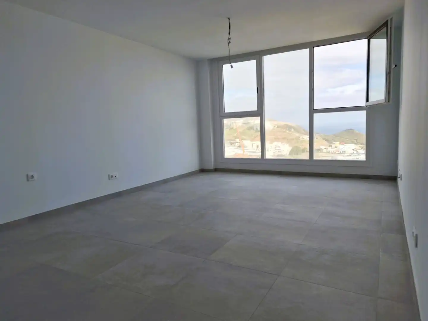 Sala de estar de Piso en venta en Las Palmas de Gran Canaria con Calefacción, Trastero y Piscina comunitaria