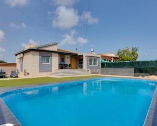 Swimming pool of Single-family semi-detached for sale in Torrevieja  with Air Conditioner, Terrace and Swimming Pool