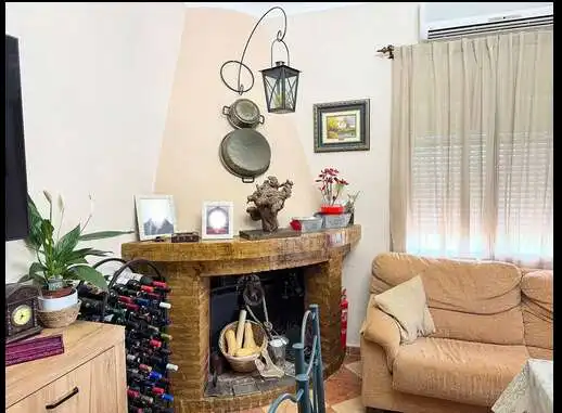Living room of Houses for sale in Utrera  with Air Conditioner, Private garden and Storage room