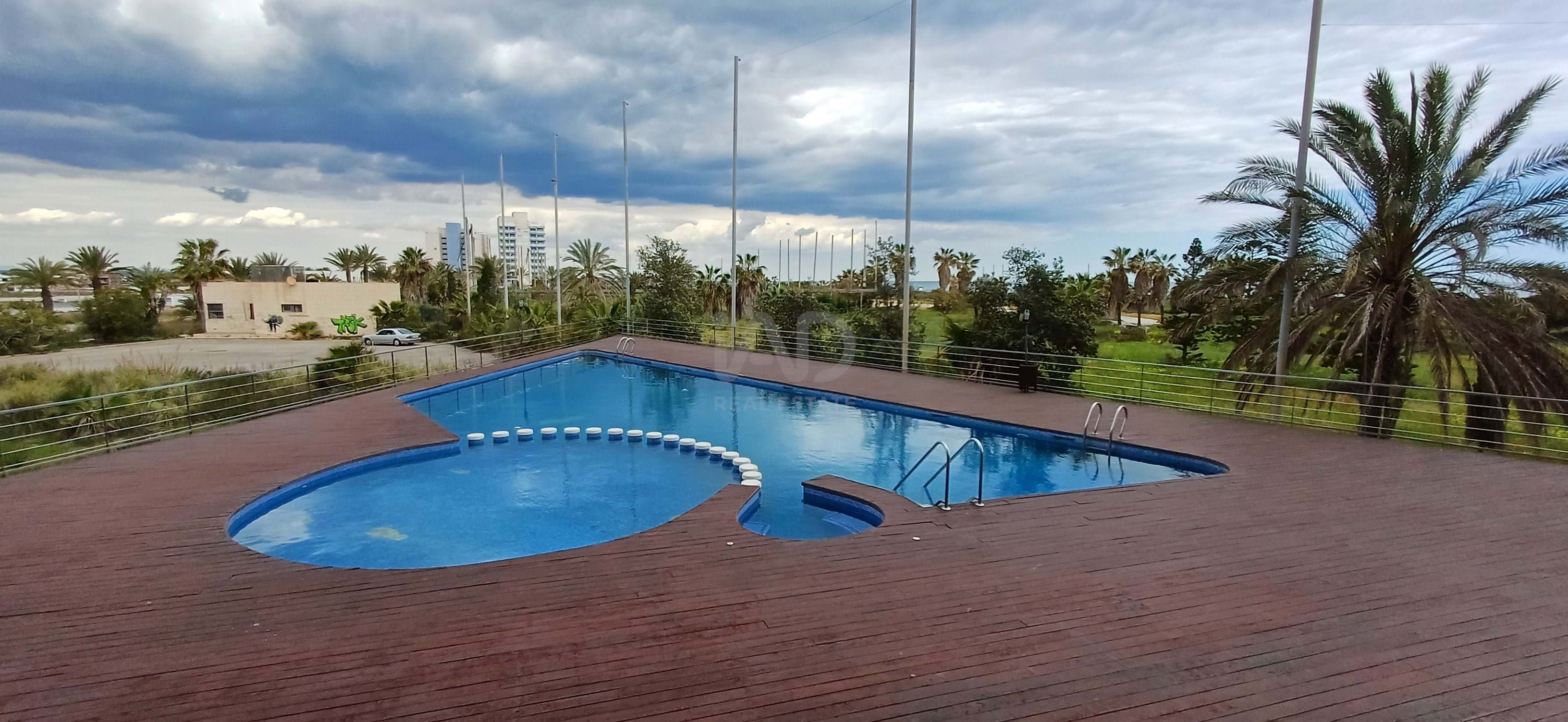 Swimming pool of Flat for sale in La Manga del Mar Menor