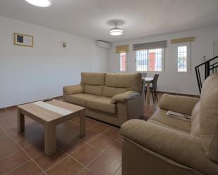 Sala d'estar de Casa adosada en venda en Freila amb Aire condicionat, Terrassa i Balcó